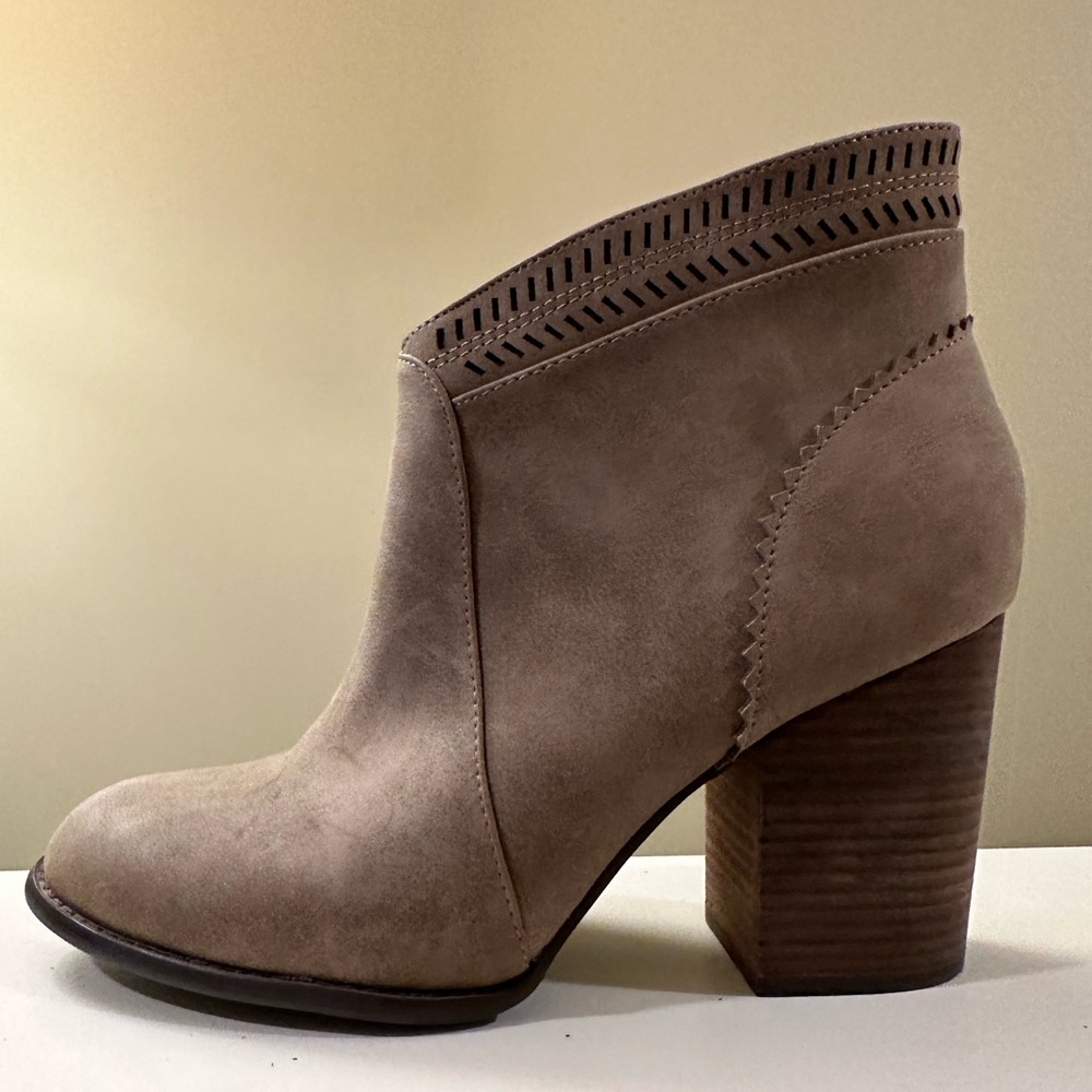 Restricted faux suede heeled boot with zipper side access. Size 10